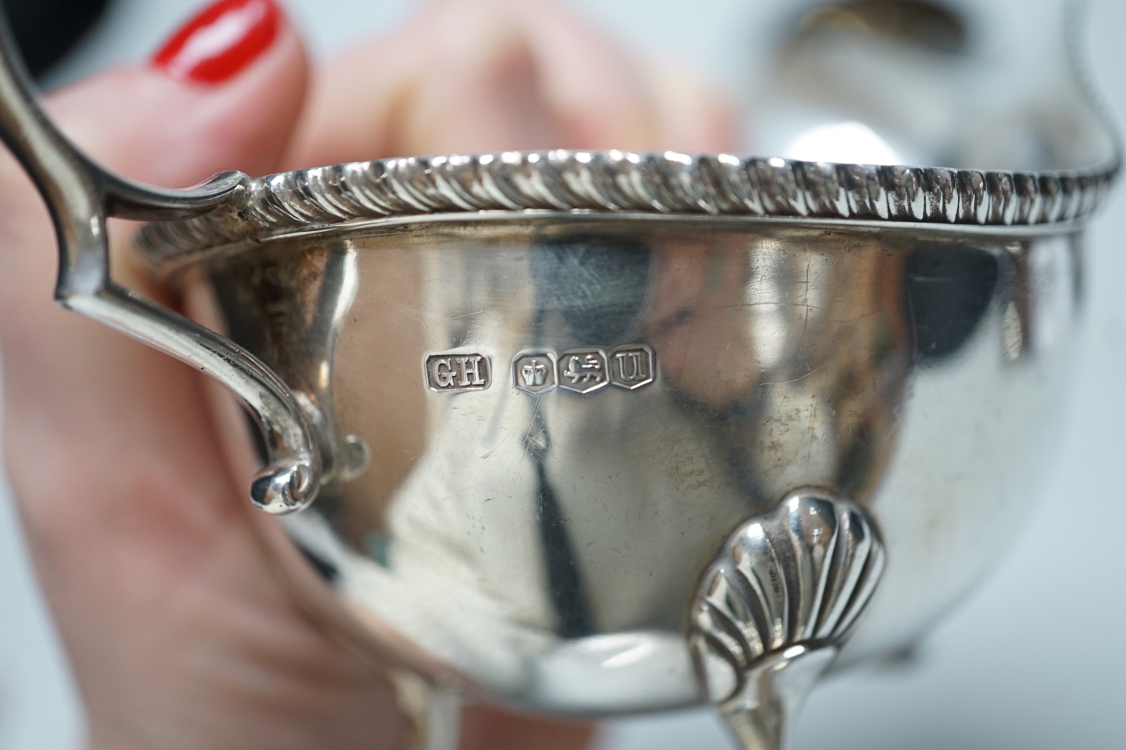 Three assorted 20th century silver sauceboats, longest 14.2cm